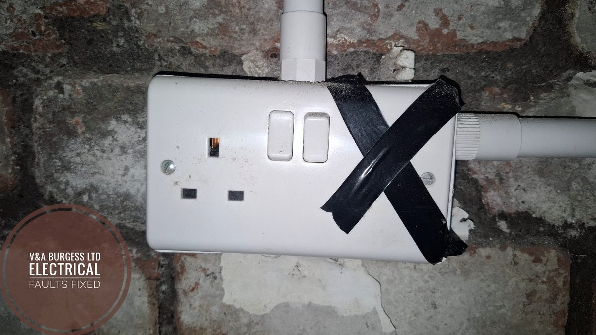 Socket with a trapped wire causing a fault at a house in Allerton, Liverpool