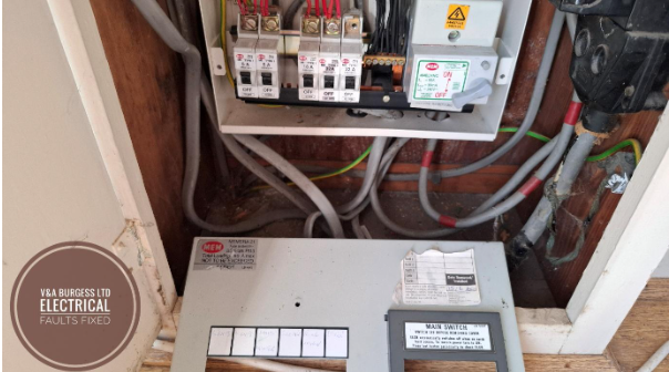 An old consumer unit with cover removed